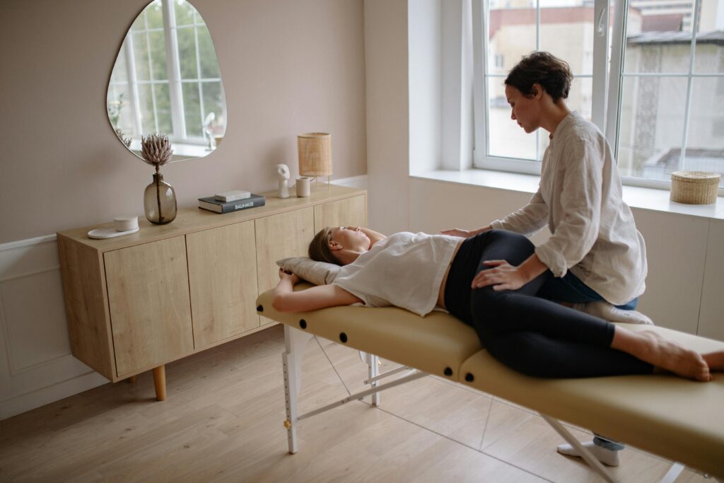 A Chiropractor attending to her patient